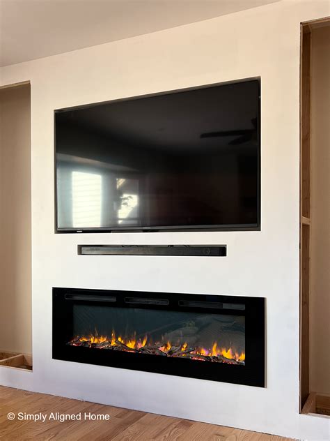 can you put an electric fireplace in the plasterboard box|inserting electric fireplace into wall.